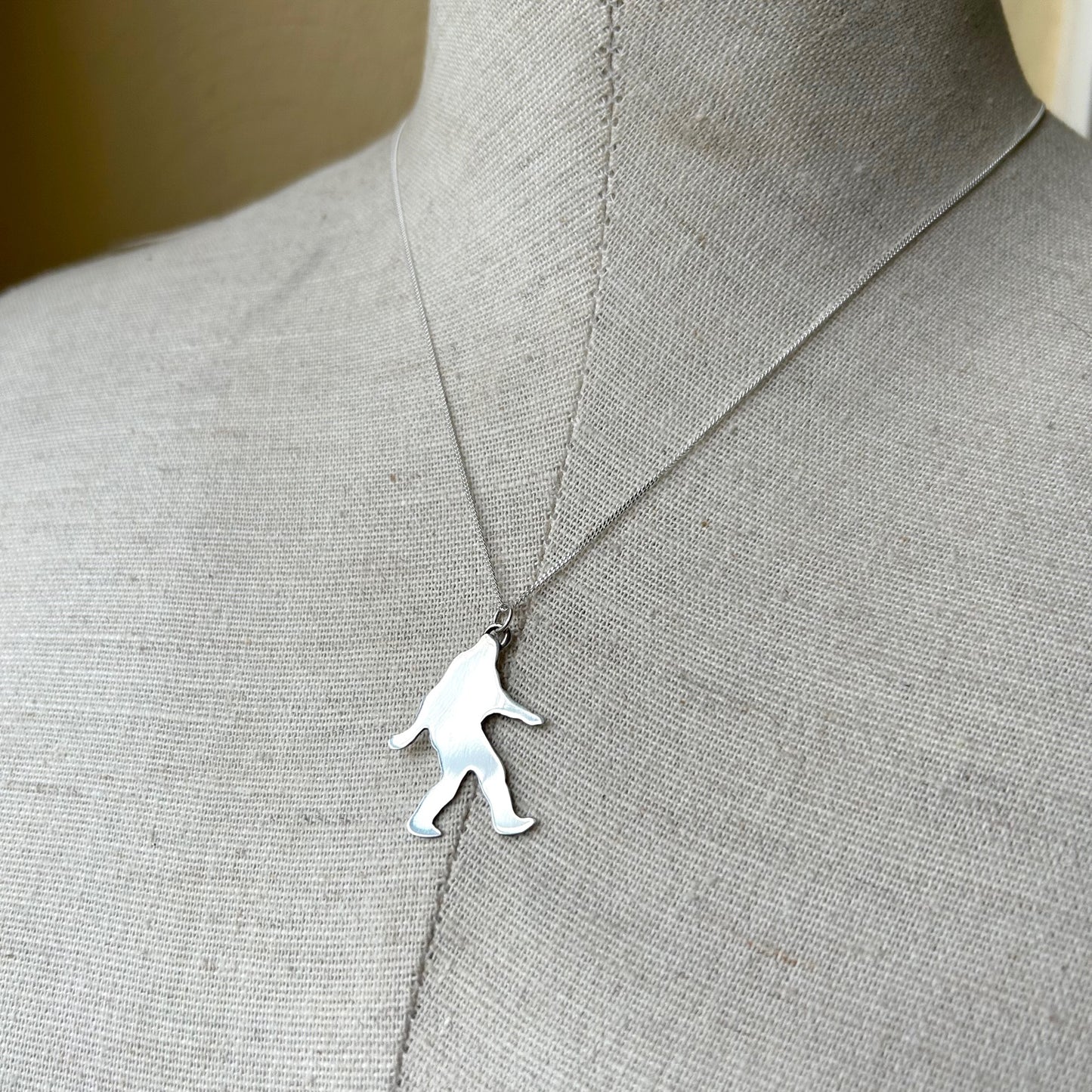 Silver Bigfoot Necklace